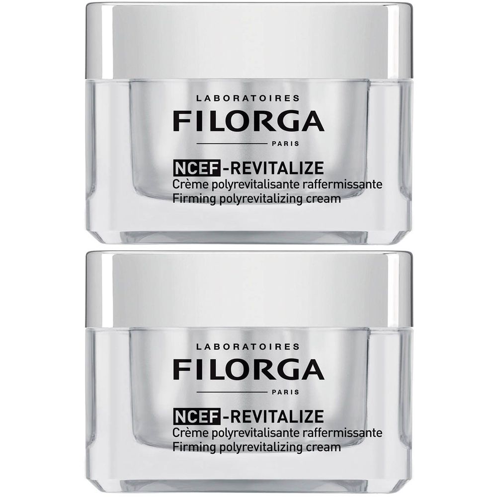 Twee crèmepotten met witte deksels. Opschrift: FILORGA, NCEF-REVITALIZE, Crème polyrevitalisante raffermissante, Firming polyrevitalizing cream.
