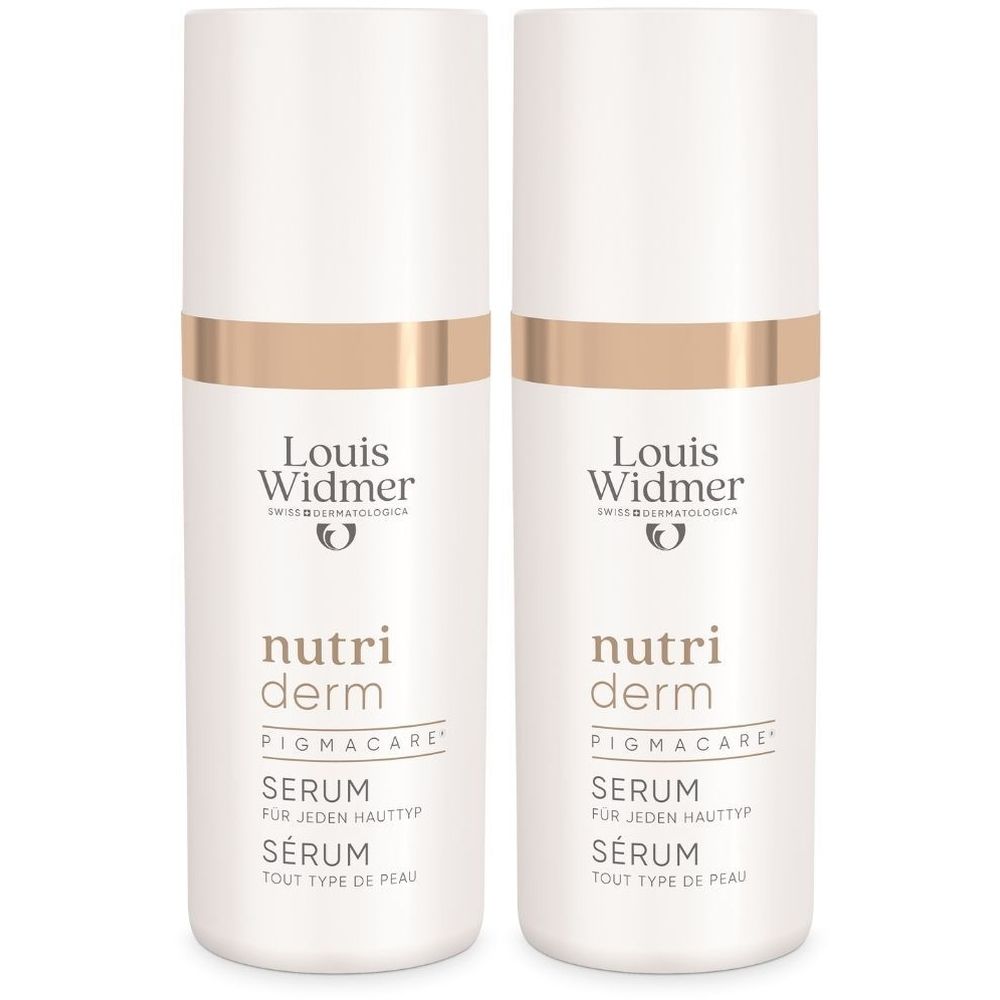 Twee witte flacons met gouden details. Opschrift: Louis Widmer, Nutriderm Pigmacare Serum. Tekst in het Duits en Frans.