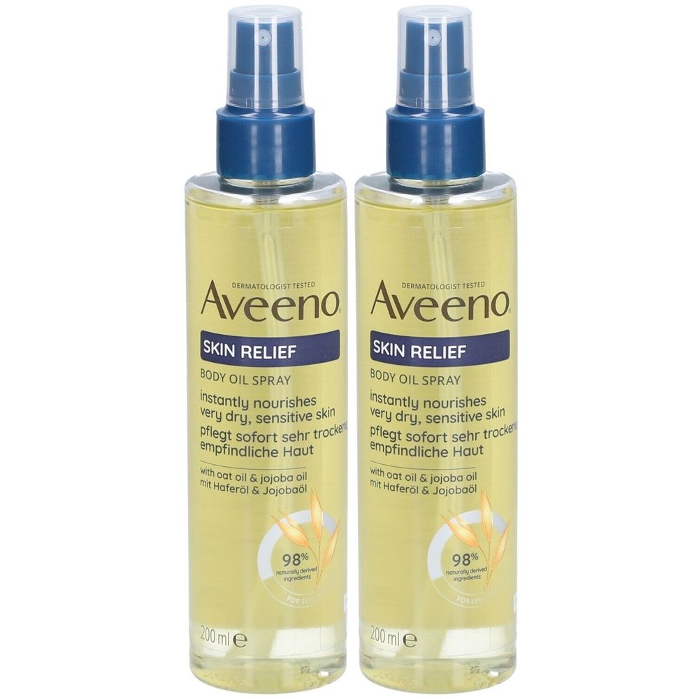 Deux flacons de spray corporel Aveeno Skin Relief. Liquide jaune dans des flacons transparents avec un pulvérisateur bleu. Texte: Skin Relief, Body Oil Spray.