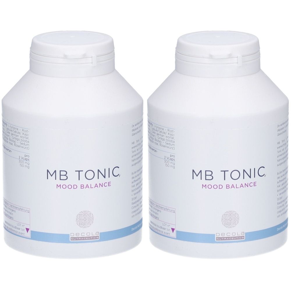 Deux flacons blancs avec bouchons. Inscription: MB TONIC MOOD BALANCE. En dessous: Decola.