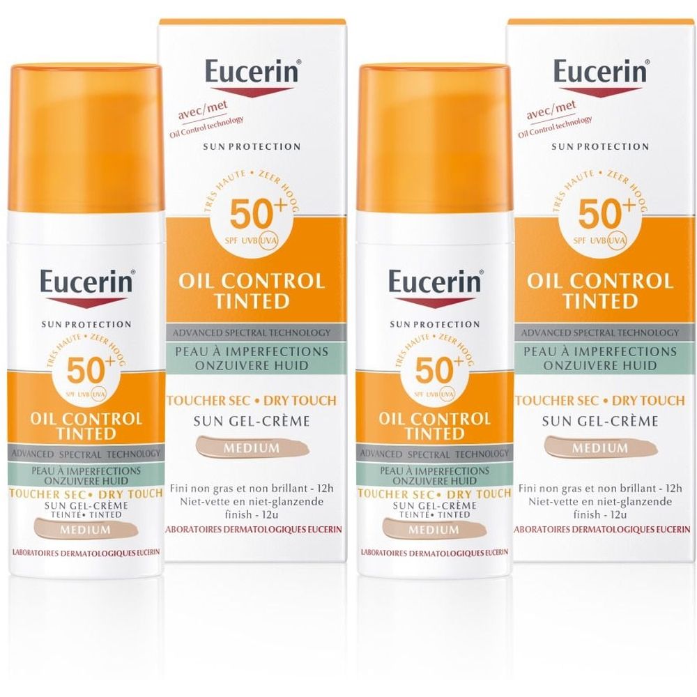 Plusieurs tubes de crème solaire Eucerin. Bouchon orange, carton blanc avec informations et SPF 50+.