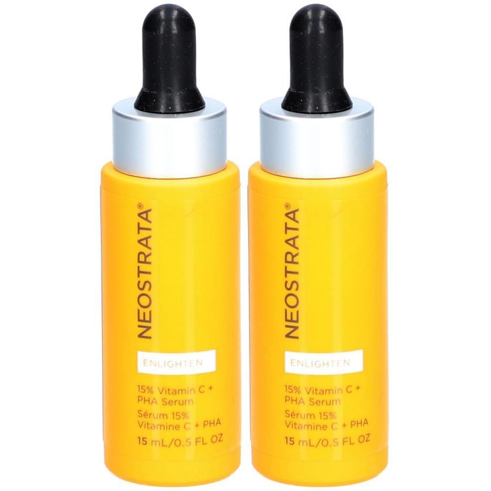 Twee gele flessen Neostrata serum met zwarte pipetten. Opschrift: 15% Vitamine C + PHA Serum.