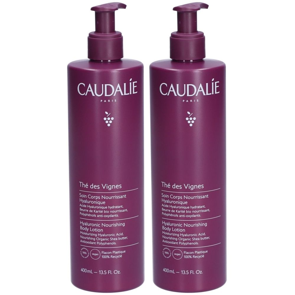 Twee flessen Caudalie Thé des Vignes bodylotion met pomp. Paarse flessen met witte tekst en druivenlogo.