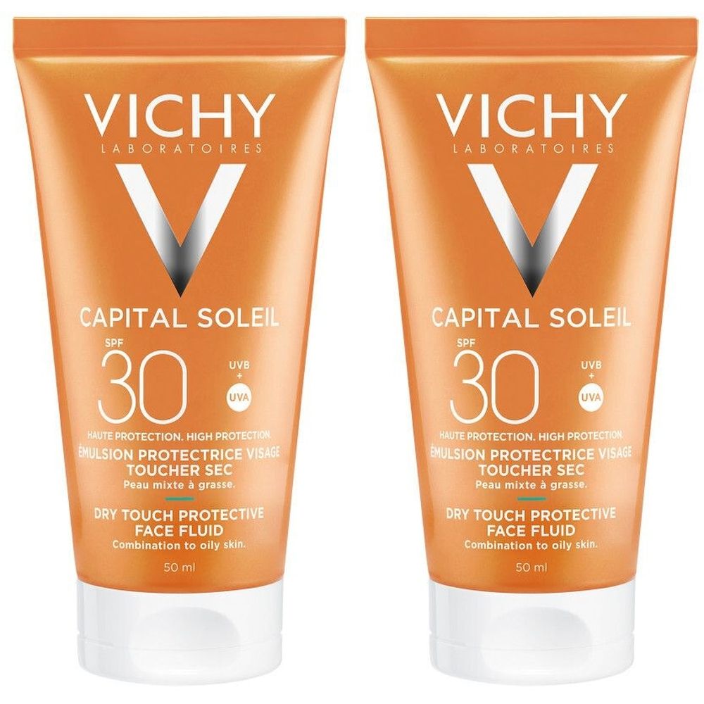 Deux tubes de Vichy Capital Soleil SPF30. Tubes orange avec bouchon blanc. Texte: Capital Soleil, SPF 30, Dry Touch Face Fluid.