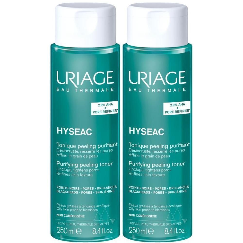 Twee flessen Uriage Hyseac Tonique Peeling Purifiant. Turquoise vloeistof, witte dop. Tekst: 2.9% AHA + Pore Refiner.