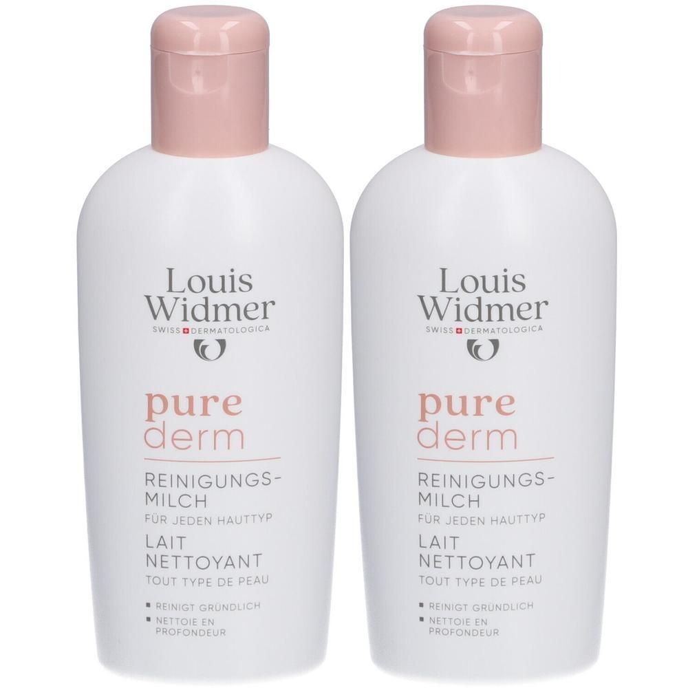 Twee flessen Louis Widmer Purederm Reinigingsmelk. Witte flessen met roze dop. Opschrift: pure derm, Reinigingsmelk, voor elk huidtype.