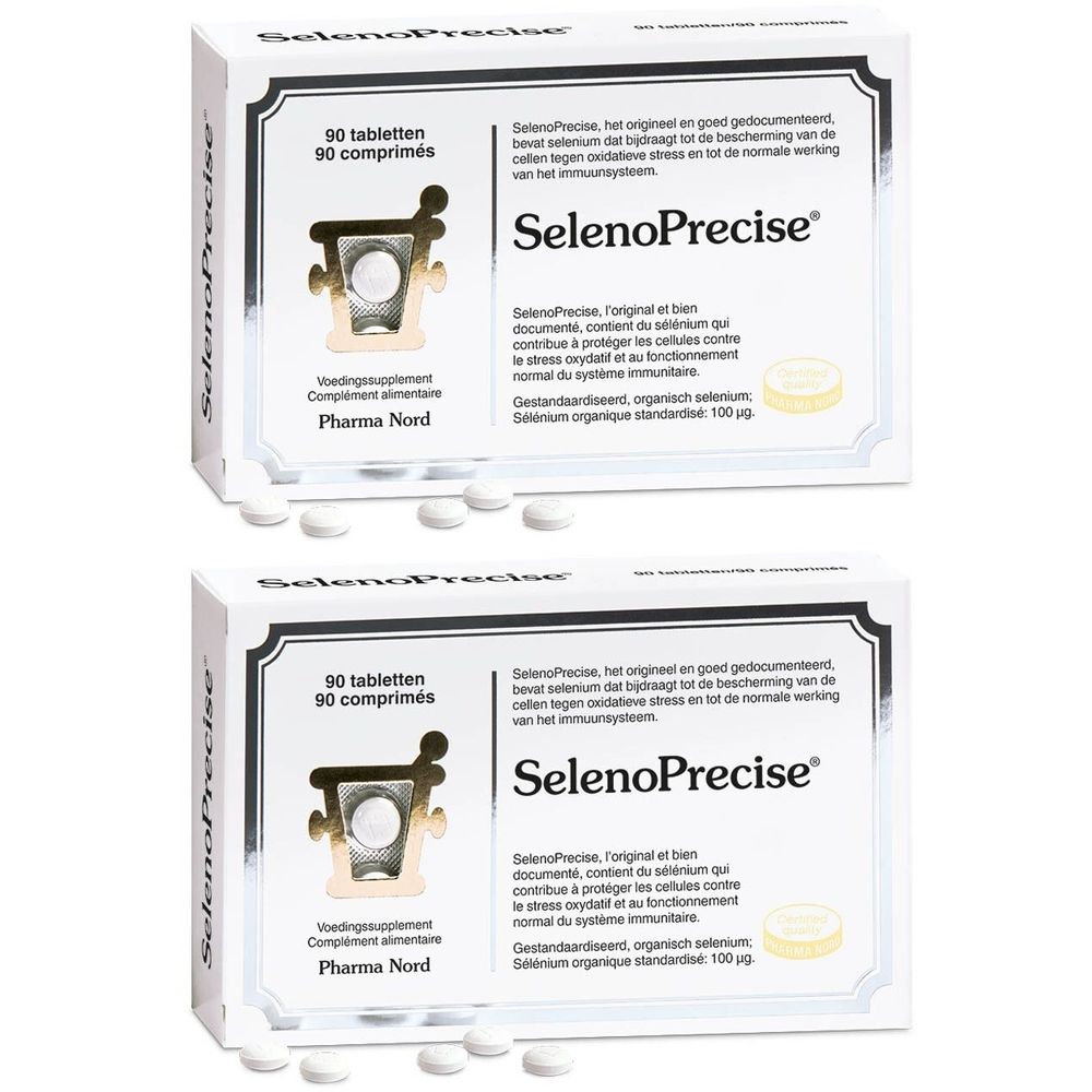 Deux boîtes de SelenoPrecise avec comprimés. Inscription : 90 comprimés, Pharma Nord. Comprimés blancs à côté.