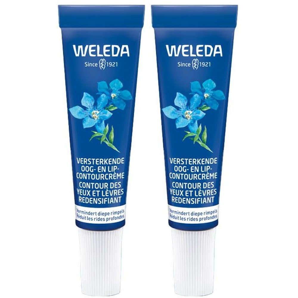 Twee blauwe tubes. Opschrift: WELEDA, Since 1921. Productnaam en beschrijving in meerdere talen. Witte dop.