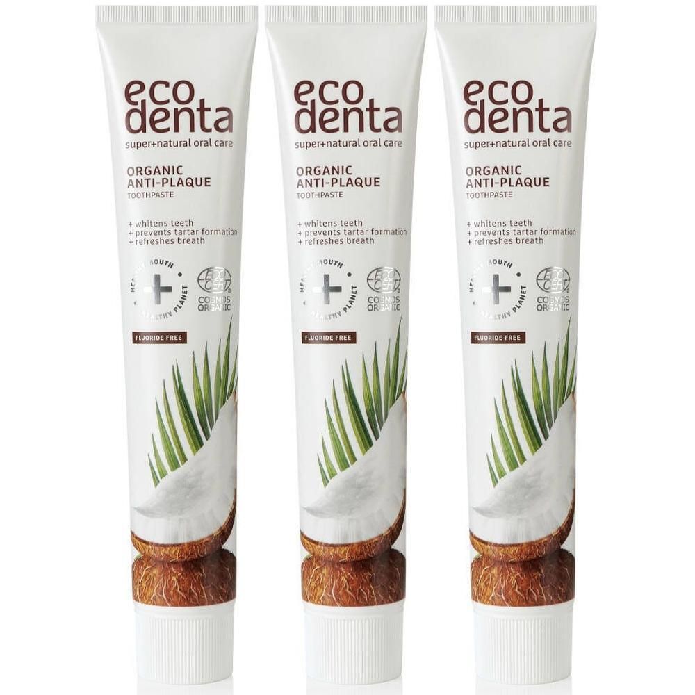 Trois tubes de dentifrice Ecodenta. Blancs, avec illustration de noix de coco et feuilles de palmier. Texte: Organic Anti-Plaque, sans fluor.