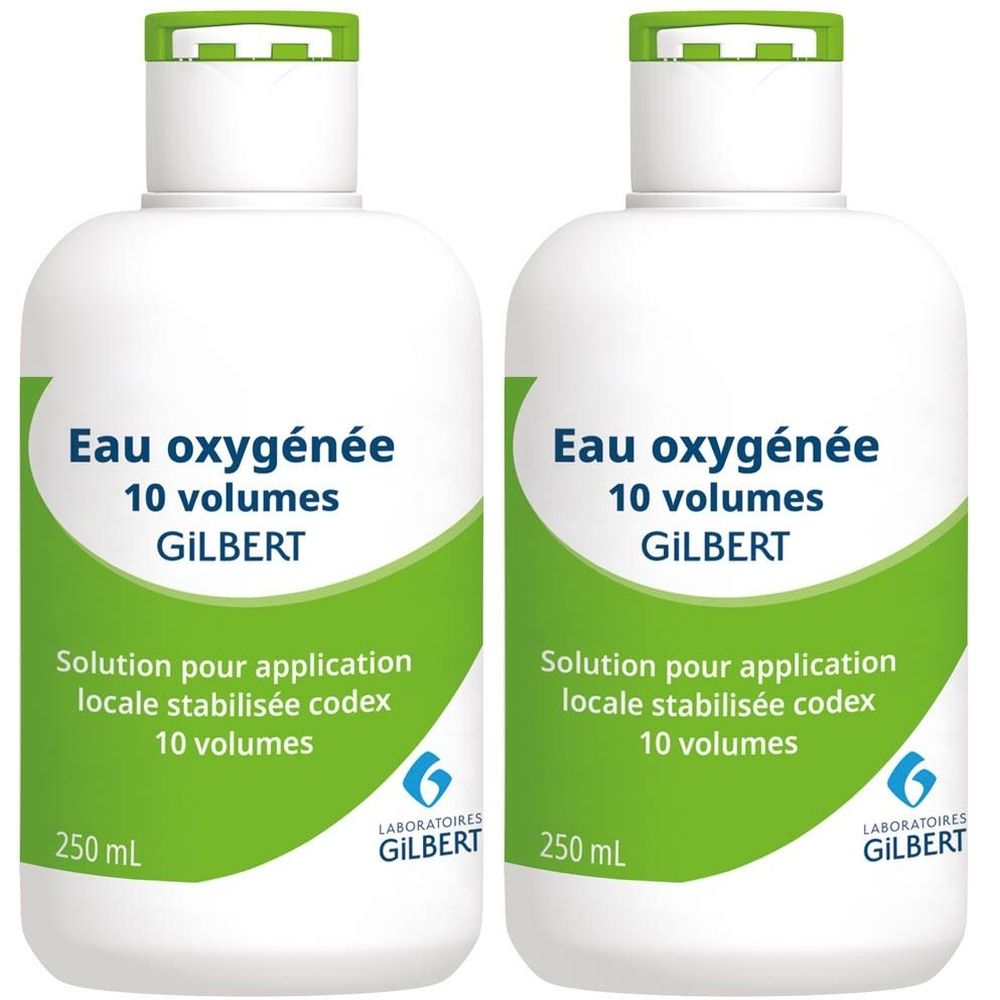 Twee witte flessen met groen etiket. Opschrift: Eau oxygénée 10 volumes GILBERT. Oplossing voor lokale toepassing.