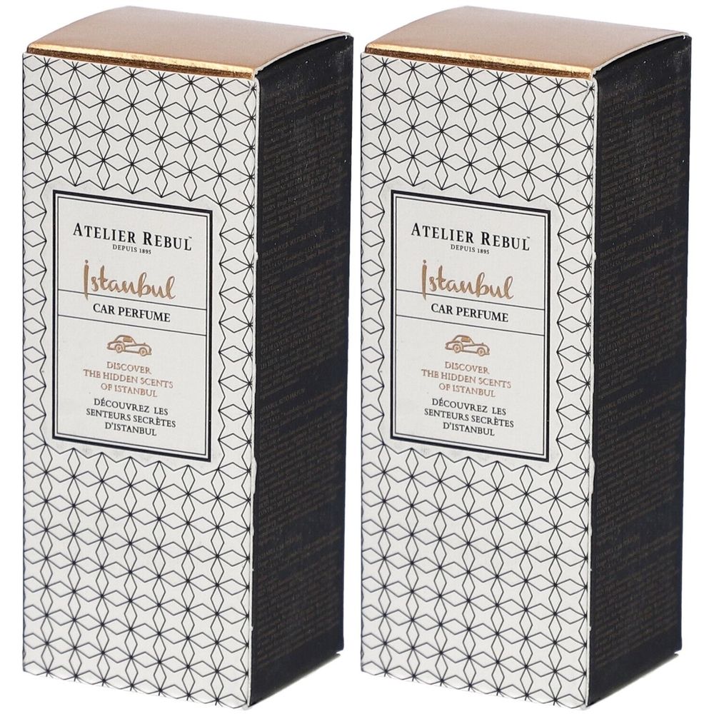 Twee rechthoekige dozen met gouden deksels. Op de voorkant staat "ATELIER REBUL Istanbul Car Perfume". Zwart geometrisch patroon.