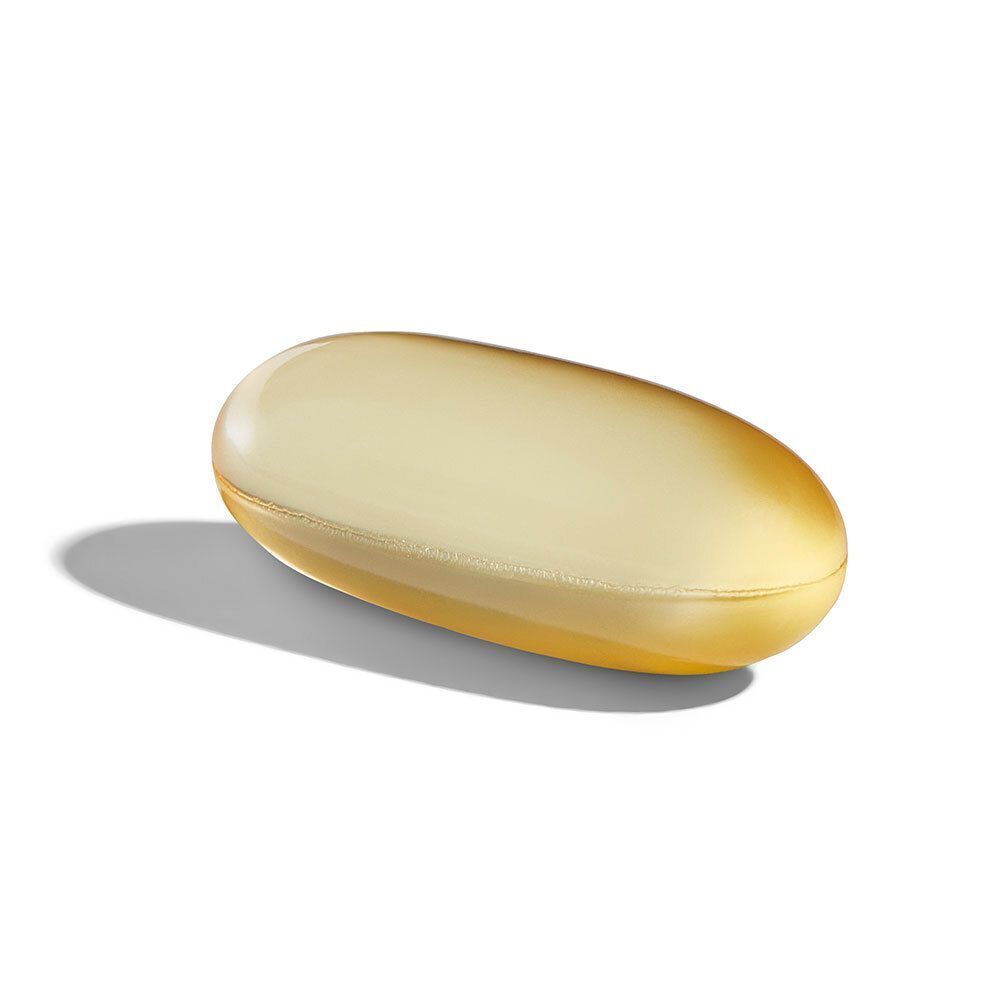 Gélule ovale jaune sur fond blanc. Légère ombre.