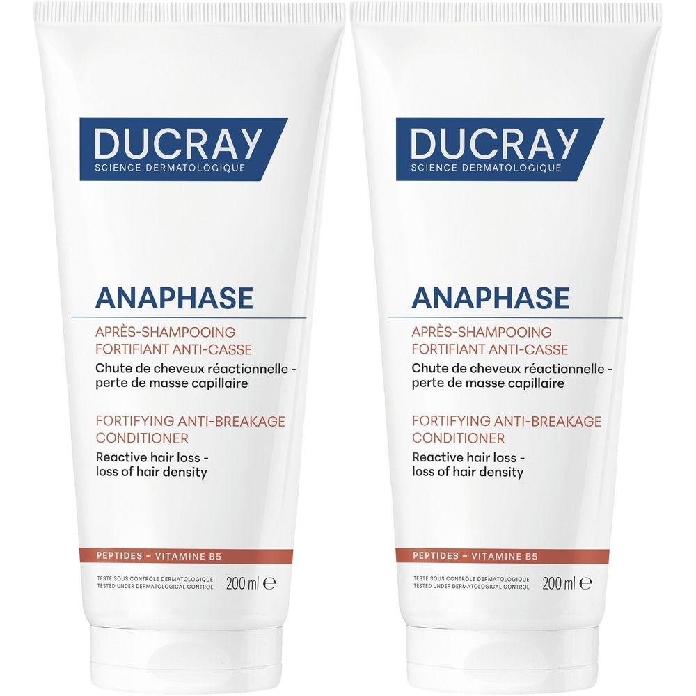 Twee witte tubes Ducray Anaphase+ conditioner. Opschrift: Après-shampooing fortifiant anti-casse. Voor reactieve haaruitval.