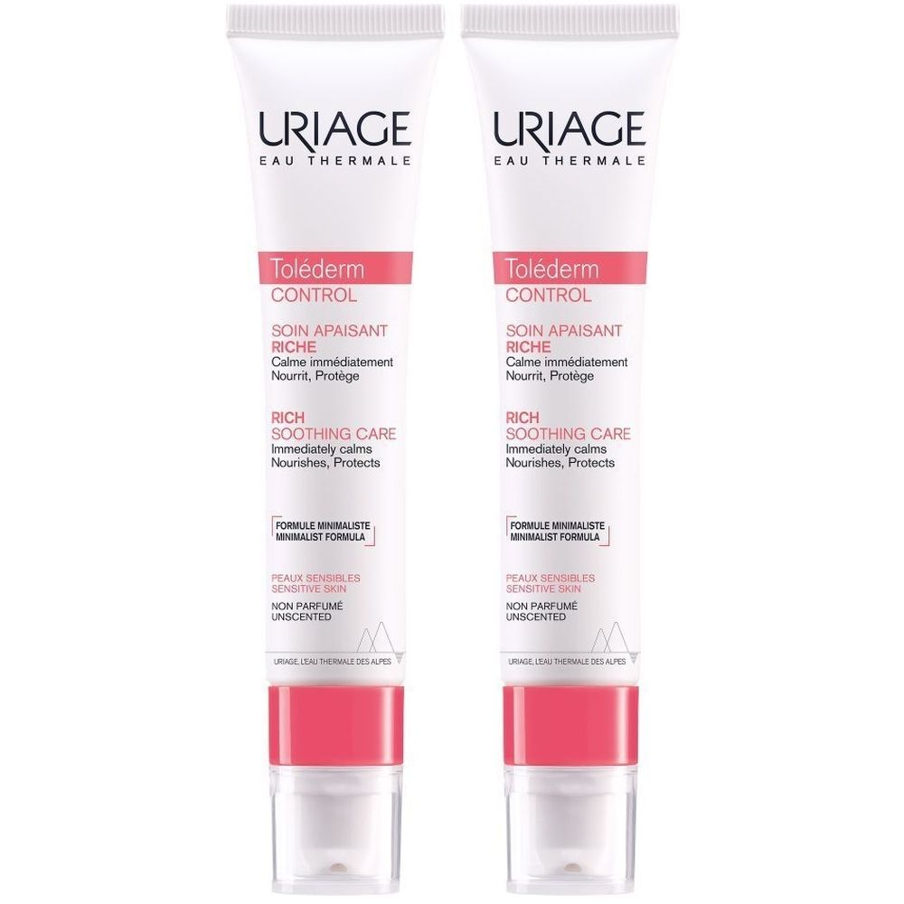Twee tubes Uriage Toléderm Control Soin Apaisant Riche. Witte tubes met roze accenten en tekst. Productnaam en merk zichtbaar.