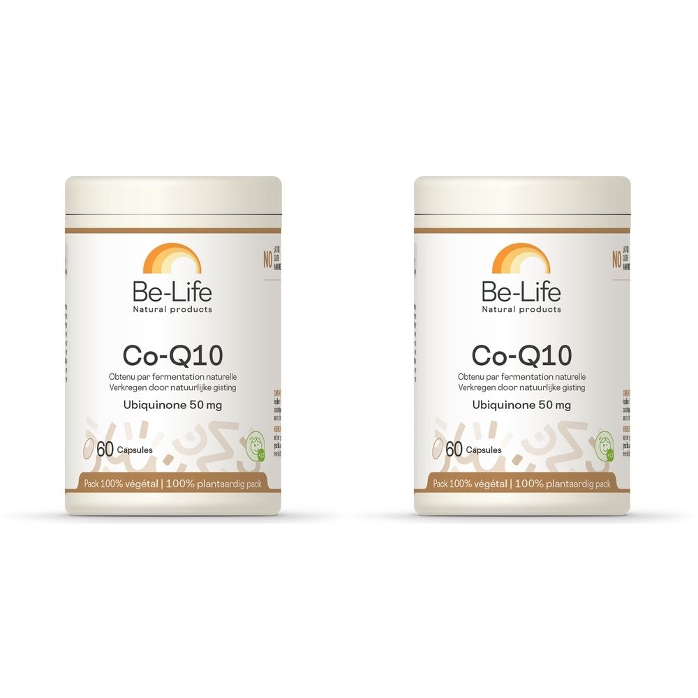 Twee witte potten met "Be-Life Co-Q10". Opschrift: Ubiquinone 50 mg, 60 capsules. Verpakking met zonlogo.