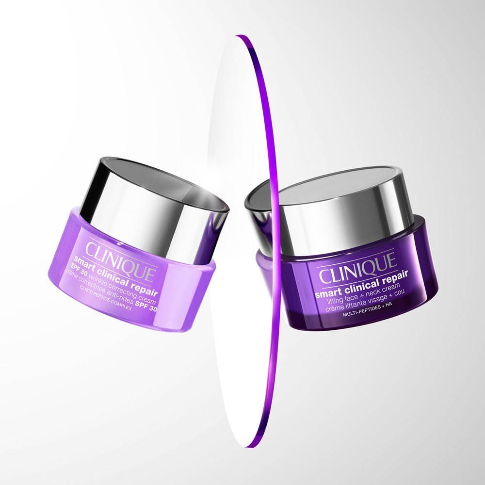 Deux pots violets de crème Clinique Smart Clinical Repair, un avec SPF 30.
