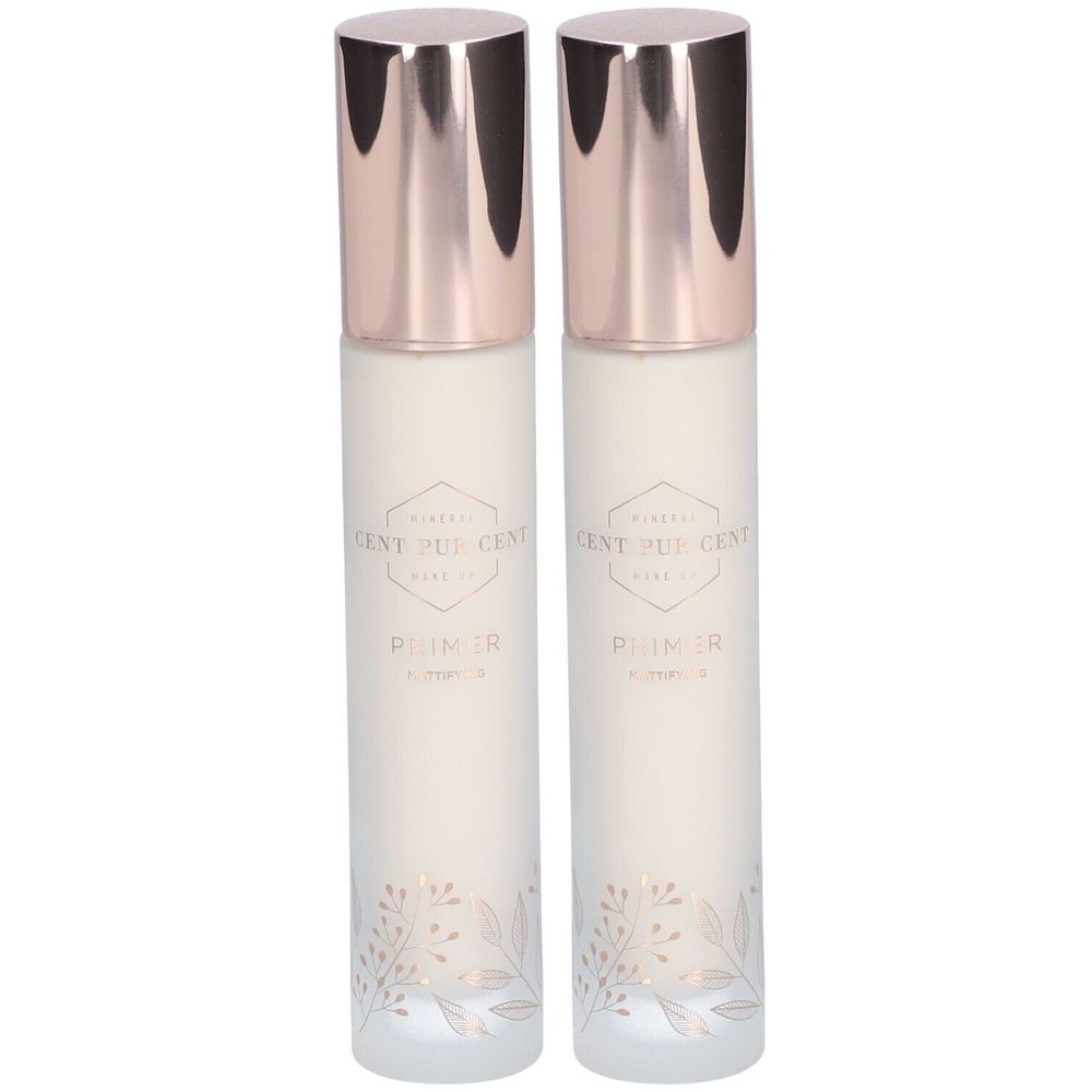 Twee flacons met roségouden doppen. Opschrift: CENT PUR CENT, Primer. Bloemenpatroon onderaan.