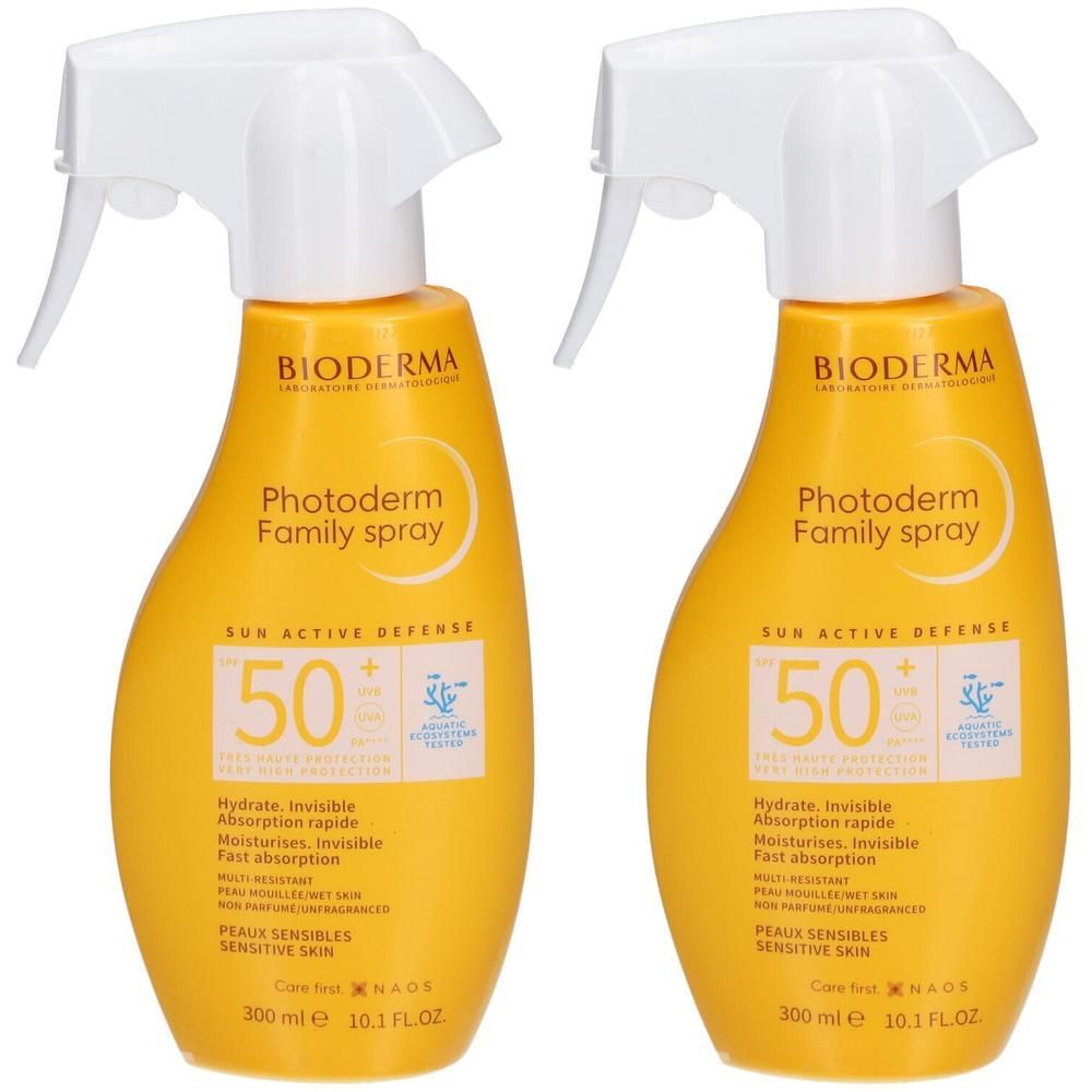 Twee gele spuitflessen met witte sproeikop. Opschrift: BIODERMA Photoderm Family Spray SPF50+. Inhoud 300 ml.