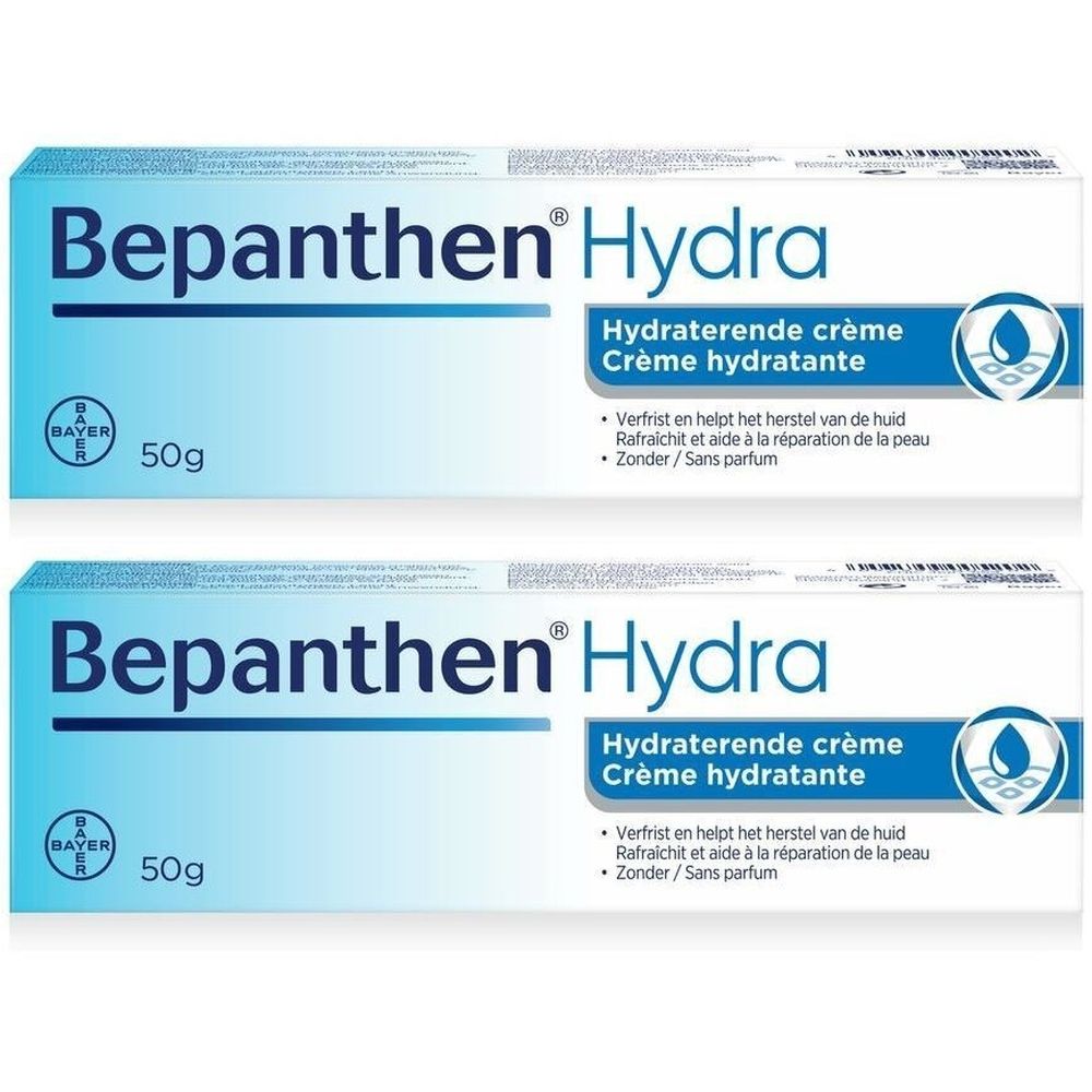 Deux boîtes de Bepanthen Hydra Crème Hydratante. Emballage bleu et blanc avec nom et logo du produit. 50g.