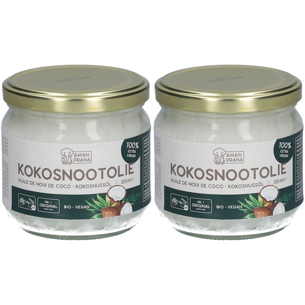 Deux pots de noix de coco avec des couvercles dorés. Les étiquettes indiquent "KOKOSNOOTOLIE" et "AMAN PRANA".