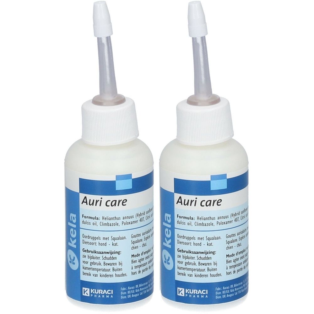 Twee flessen Kela Auri care. Witte flessen met blauwe etiketten. Opschrift Auri care en kela. Met applicator.