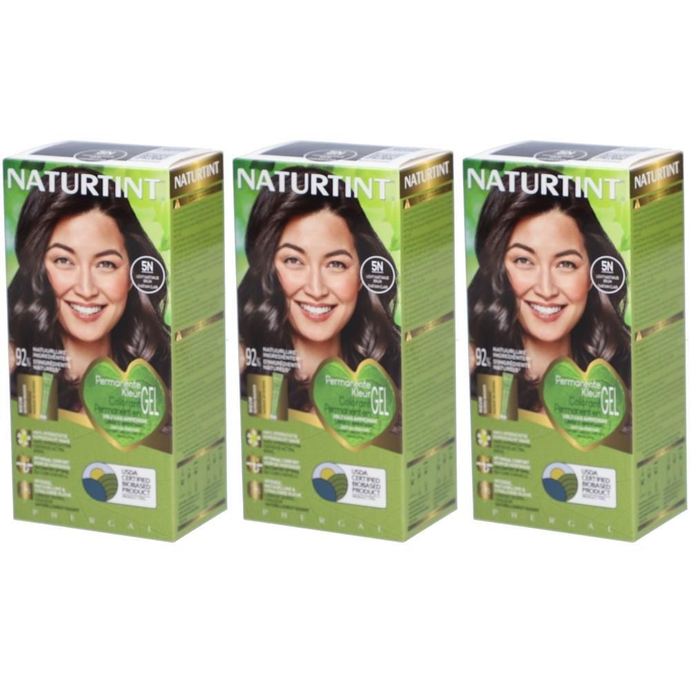Drie dozen NATURTINT® Coloration Permanente 5N. Afbeelding: vrouw met bruin haar. Groene en bruine verpakking.