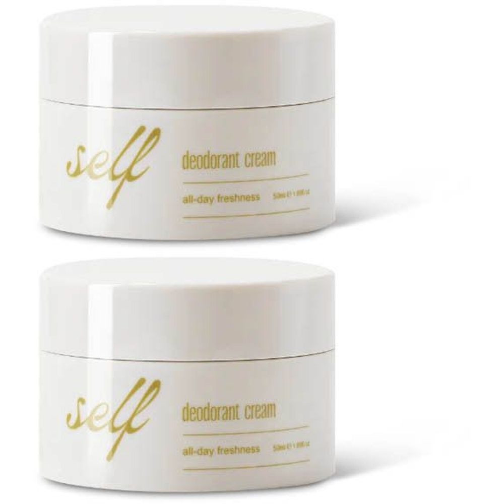 Twee crèmekleurige potten. Opschrift "self" en "deodorant cream". Ondertitel "all-day freshness".