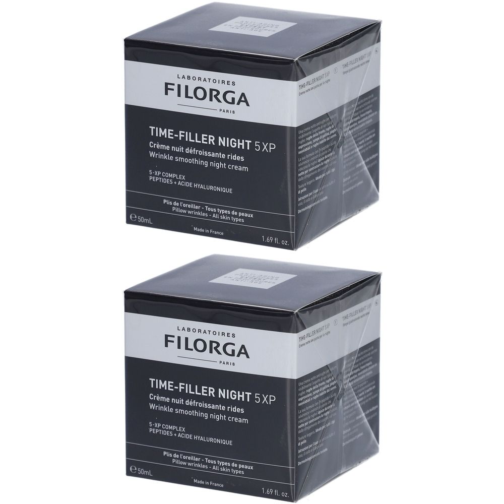 Deux boîtes de crème de nuit Filorga Time-Filler Night 5XP. Boîtes carrées noires avec texte blanc.