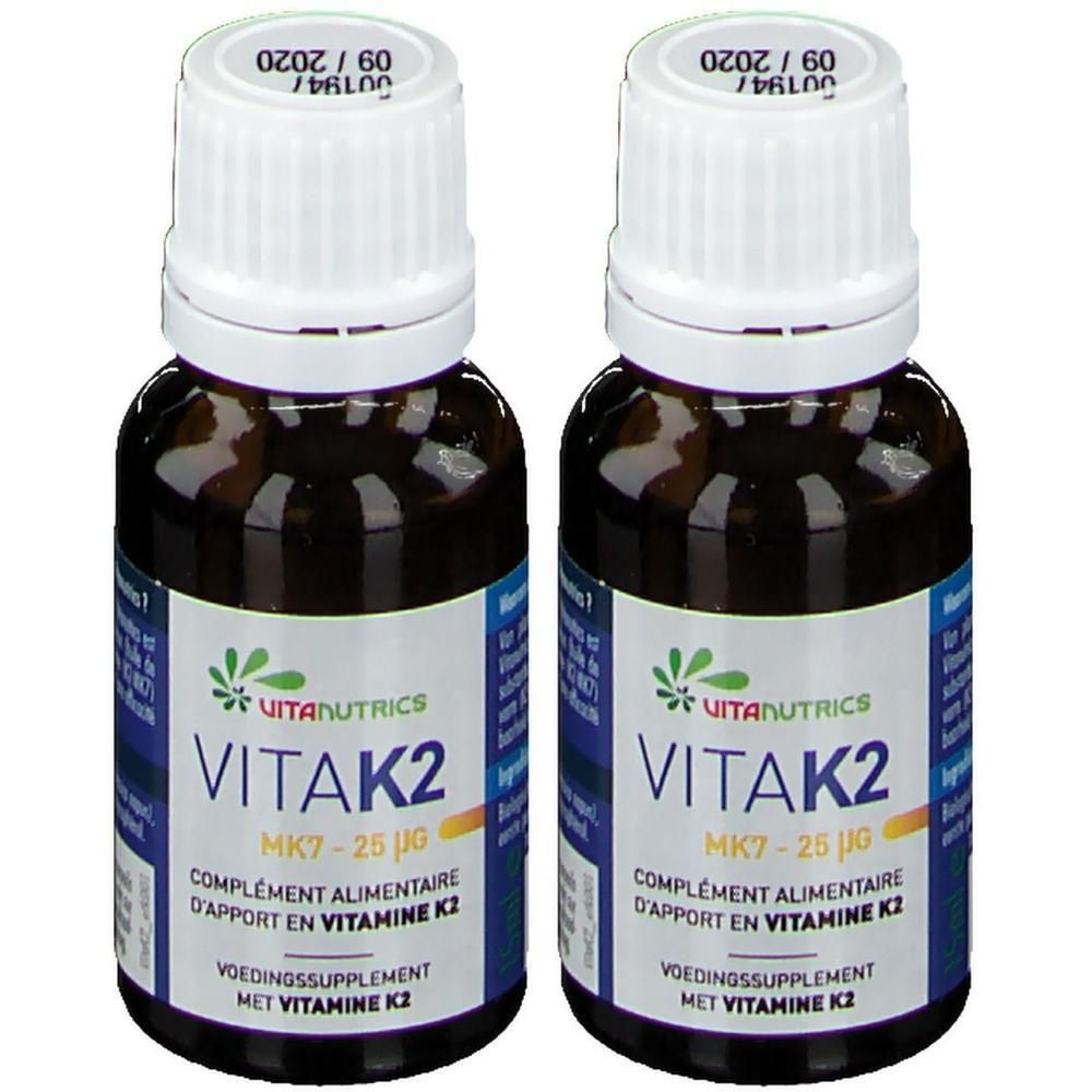 Deux flacons de VITANUTRICS VITAK2. Flacons en verre brun avec bouchon blanc et étiquette. Inscription : VITAK2, MK7 - 25 µg.