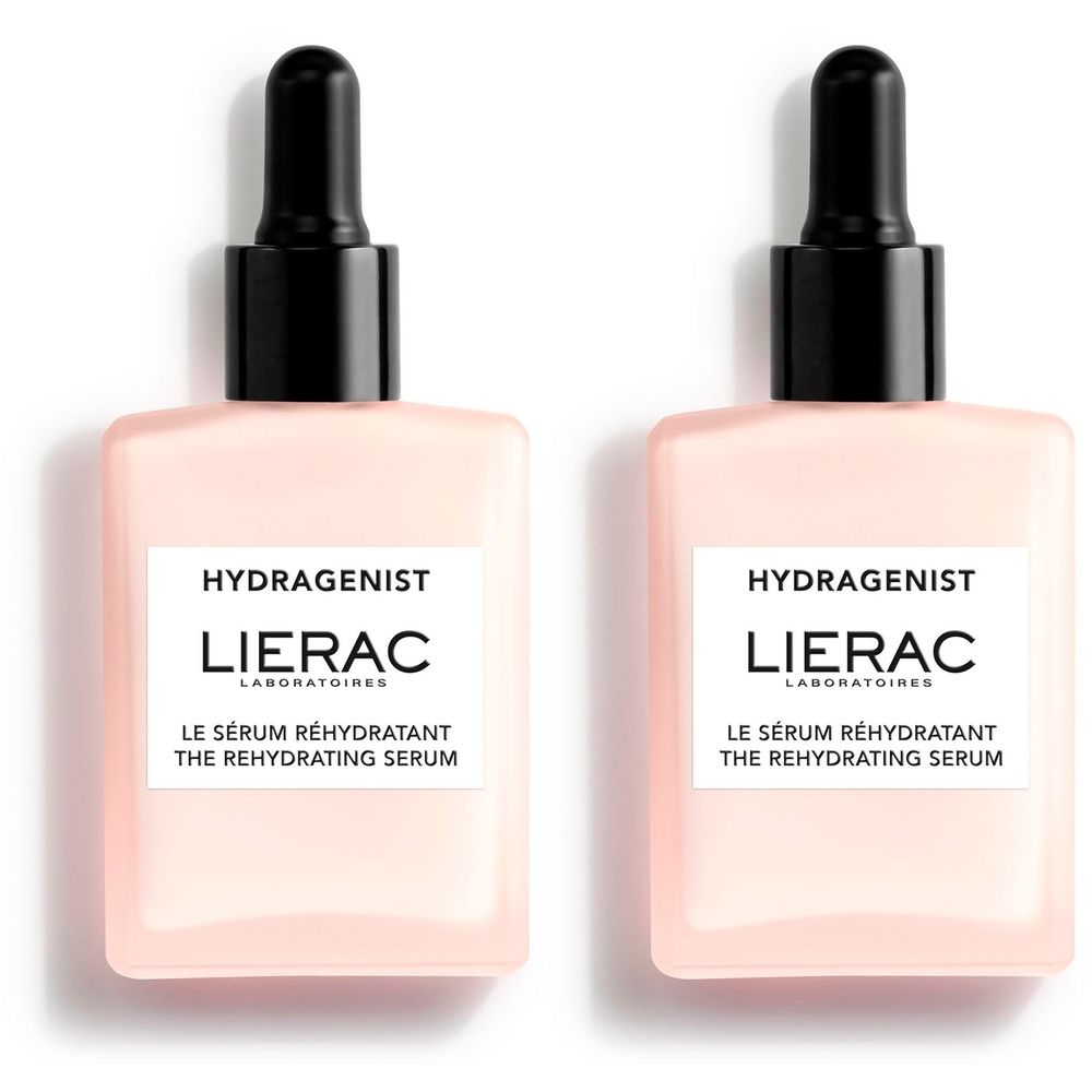 Twee roze flacons met zwarte pipetten. Labels met "HYDRAGENIST", "LIERAC" en "LE SÉRUM RÉHYDRATANT". 