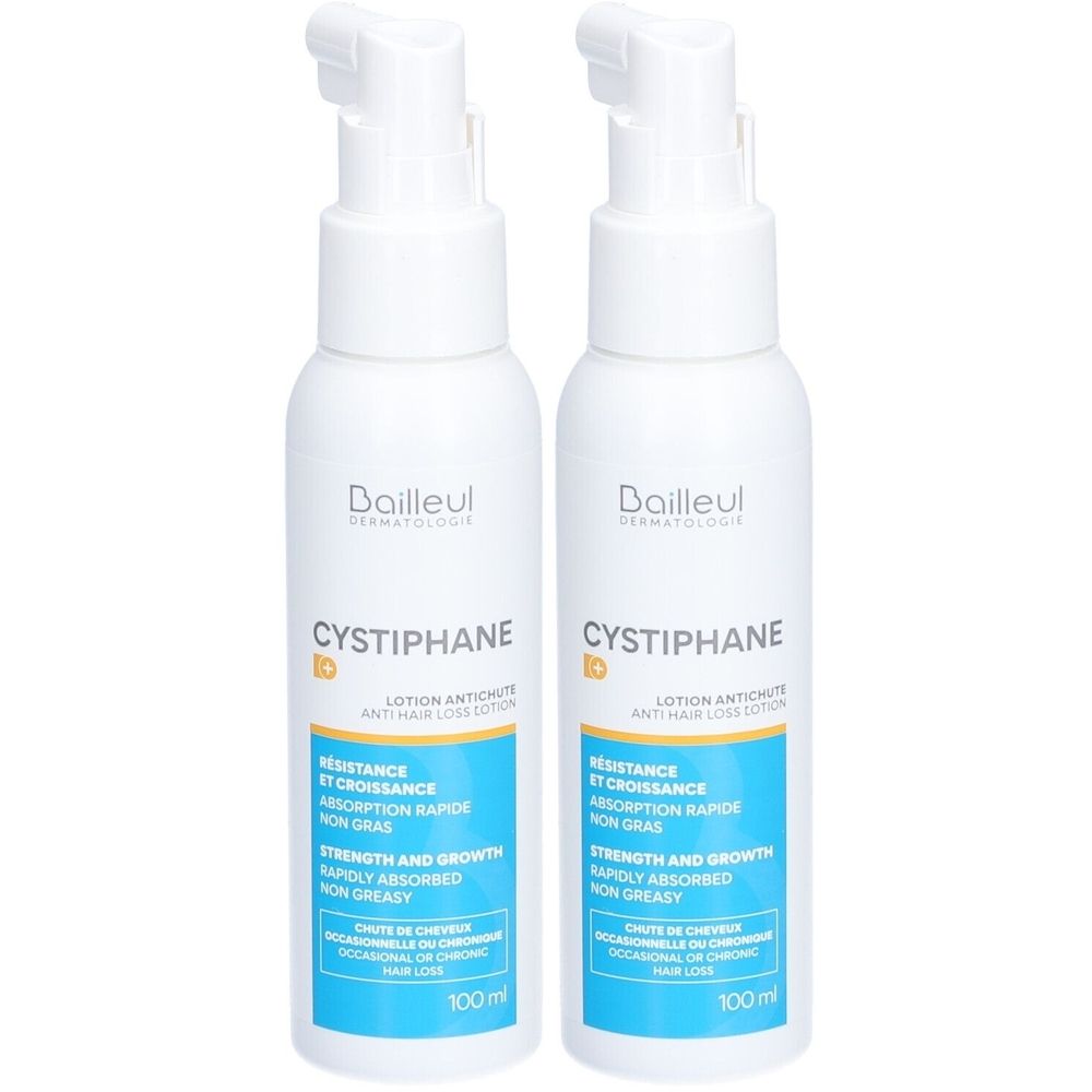 Twee witte flessen met pompkop. Opschrift: Cystiphane, Lotion Antichute. Blauwe en gele etiketten met tekst. 100 ml.