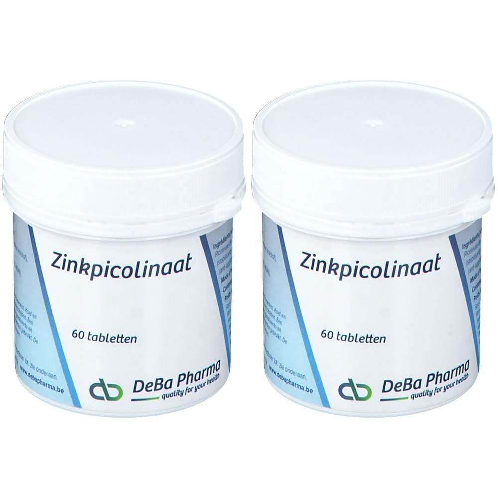 Deux pots blancs avec couvercles. Inscription Zinkpicolinaat, 60 comprimés. Logo DeBa Pharma.
