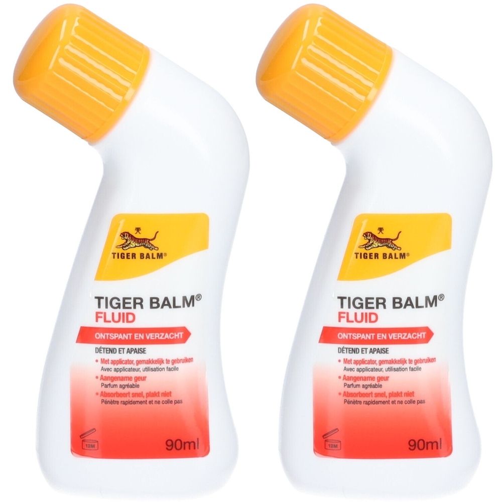 Deux flacons blancs de Tiger Balm Fluid avec bouchons jaunes. Inscription: Tiger Balm, Fluid, détend et apaise. 90ml.