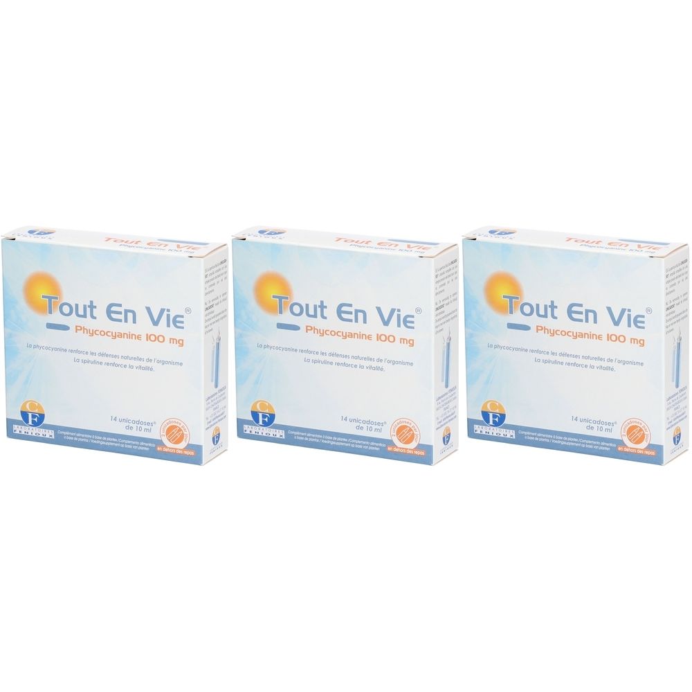 Drie dozen "Tout En Vie". Elke doos toont "Phycocyanine 100 mg". Witte verpakking met geel zonlogo.