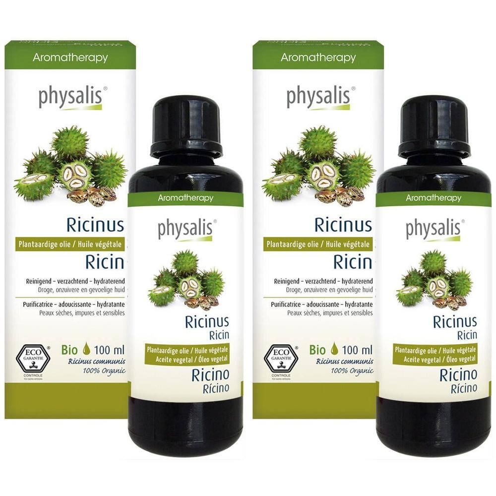 Quatre flacons avec bouchon noir et étiquette. Deux boîtes avec logo vert et nom du produit.