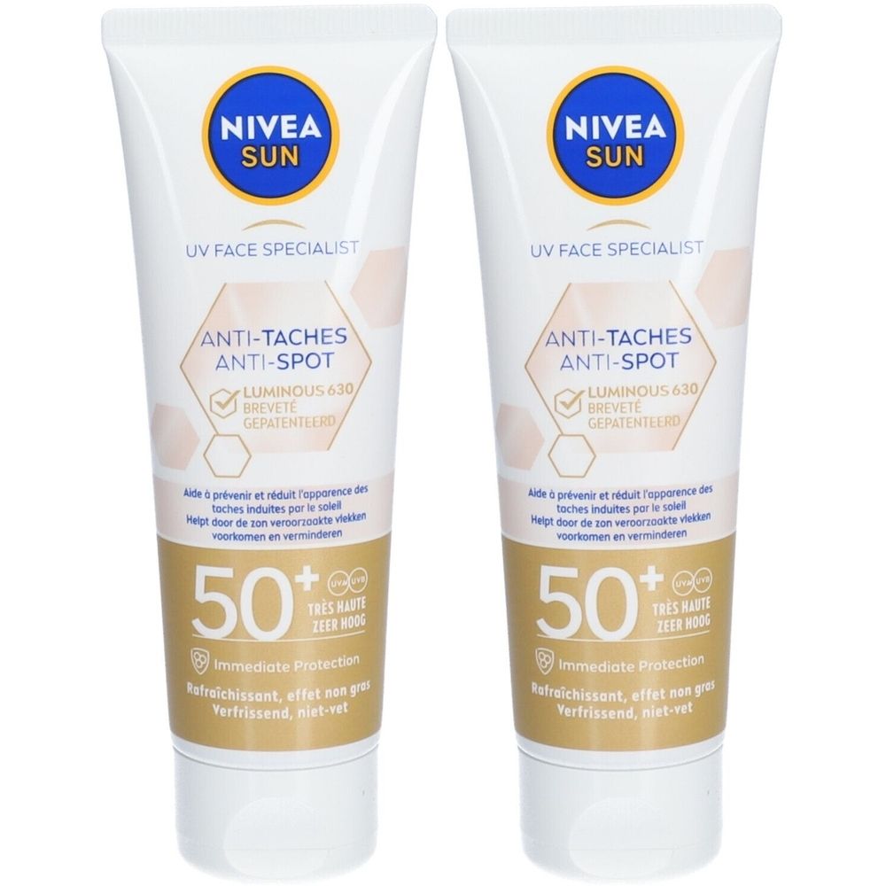 Twee tubes Nivea Sun UV Face Specialist. Wit, met blauwe dop en gouden accenten. Tekst: Anti-Taches Anti-Spot, Luminous 630, SPF 50+.