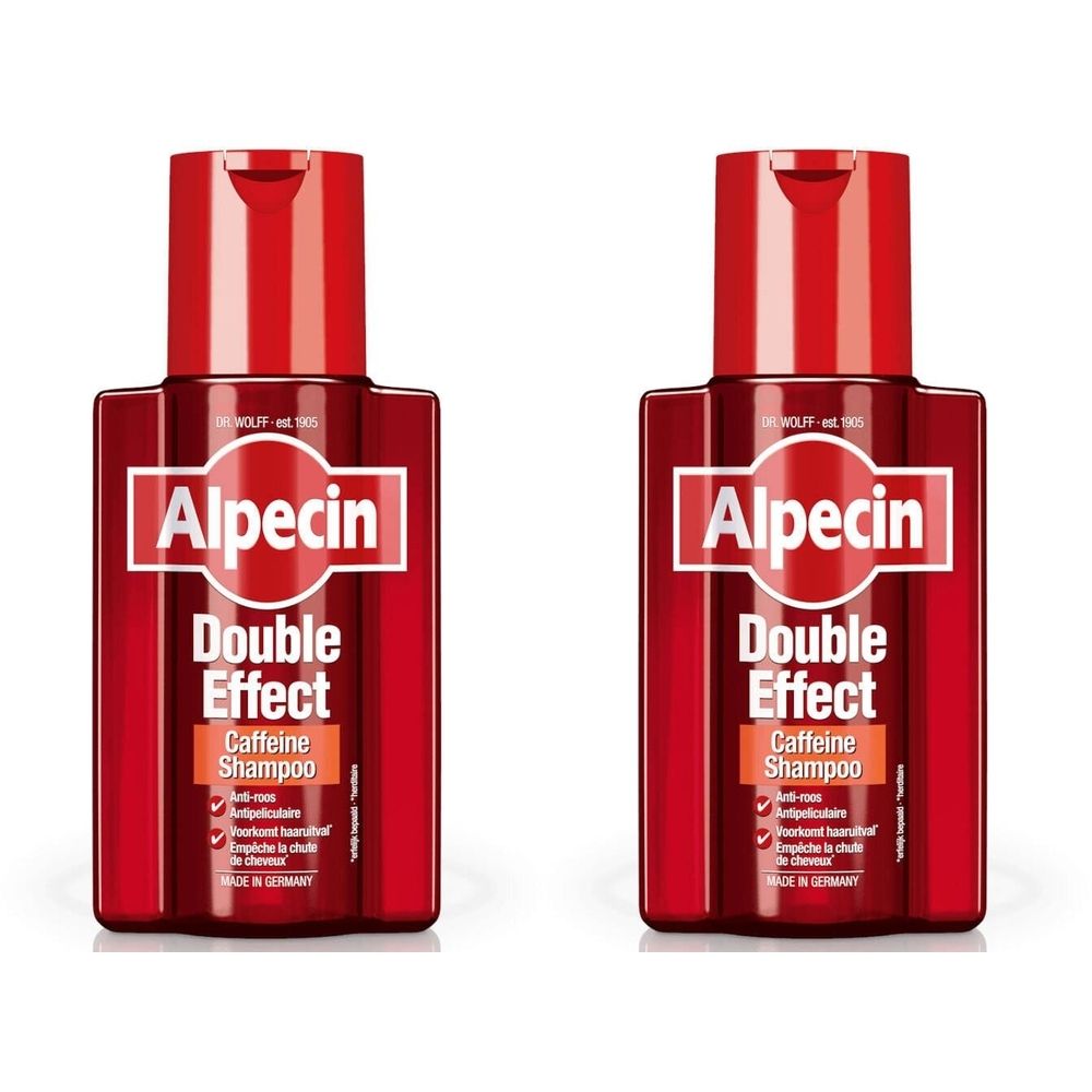 Deux flacons rouges de shampooing Alpecin Double Effect Caffeine. Inscription blanche Alpecin, Double Effect et Caffeine Shampoo.