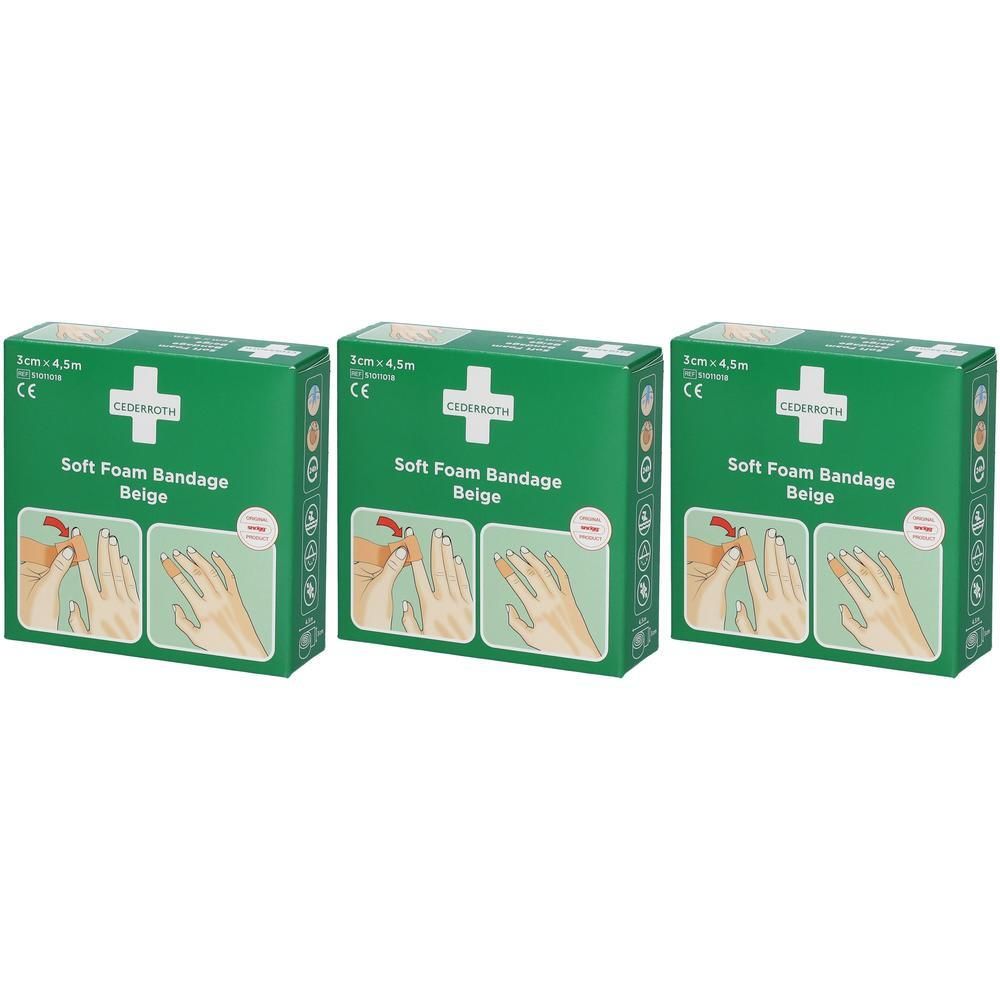 Drie groene dozen met wit kruis, tekst "Cederroth Soft Foam Bandage Beige". Afmetingen: 3 cm x 4,5 m. CE-markering.