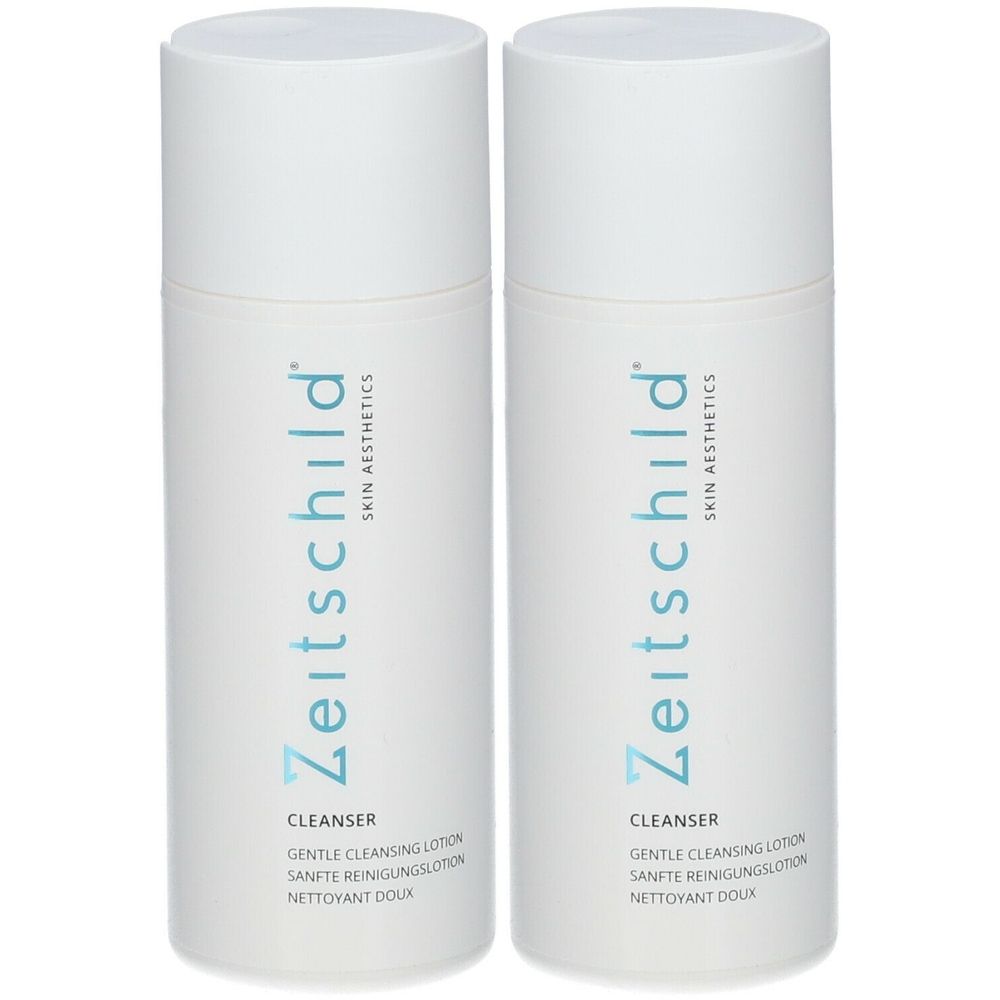 Deux flacons blancs avec impression bleue. Inscription : Zeitschild Skin Aesthetics, Cleanser, Gentle Cleansing Lotion, Sanfte Reinigungslotion, Nettoyant Doux.