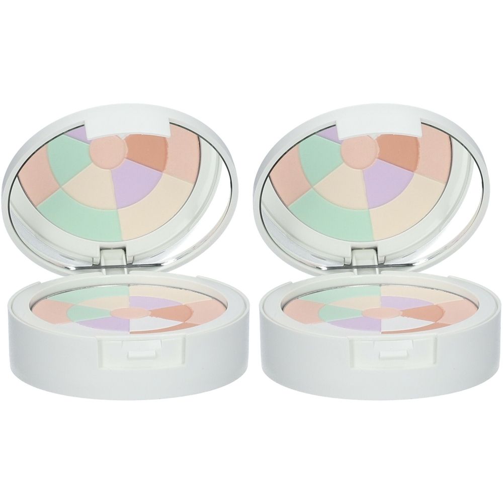 Deux boîtiers de poudre blancs ouverts, avec miroir et segments colorés. Produit cosmétique.