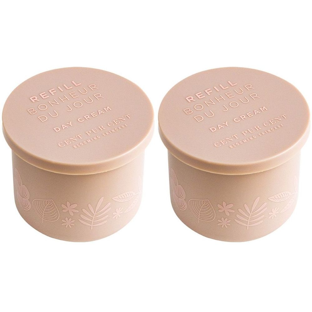 Deux pots ronds beiges avec couvercles. Sur les couvercles, on lit "REFILL BONHEUR DU JOUR DAY CREAM". Des feuilles et des fleurs ornent les côtés.