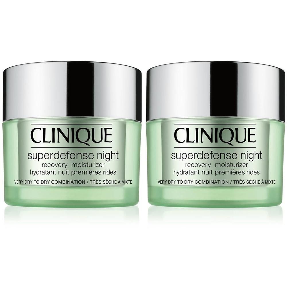Twee groene potten met zilveren deksels. Opschrift: Clinique Superdefense night, recovery moisturizer, hydratant nuit premières rides.