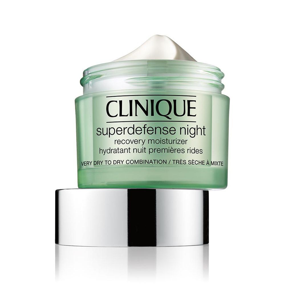 Groene pot met zilveren deksel, open. Opschrift: Clinique Superdefense night, recovery moisturizer, hydratant nuit premières rides.