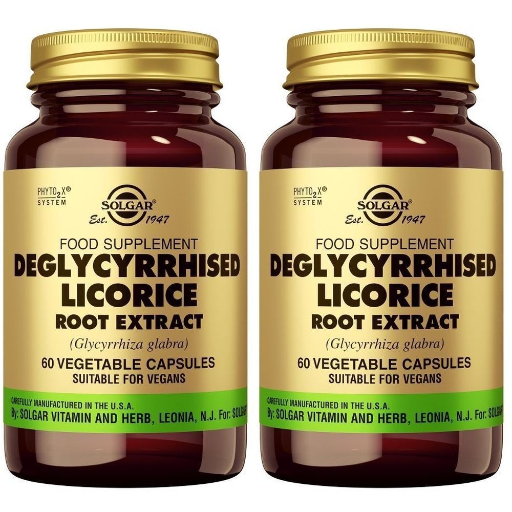 Twee flessen Solgar Deglycyrrhised Licorice Root Extract. Bruine glazen flessen met gouden doppen en etiketten. Tekst: 60 capsules.