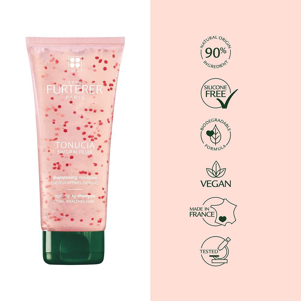 Fles met roze gel en rode deeltjes, opschrift "FURTERER TONUCIA NATURAL FILLER". Naast de fles iconen: 90% natuurlijke ingrediënten, siliconenvrij, biologisch afbreekbaar, vegan, made in France, getest.