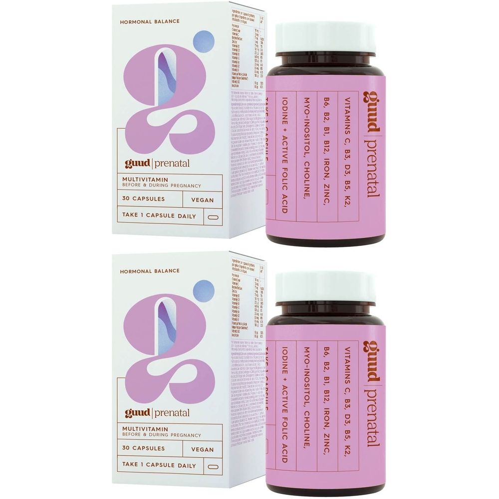 Twee dozen en flessen Guud Prenatal. Opschrift: Multivitamine, 30 capsules, vegan. Bevat vitaminen en mineralen.