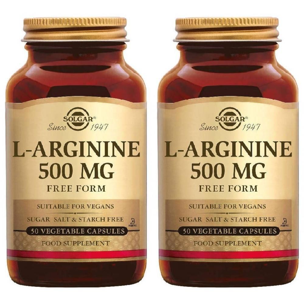Twee flessen Solgar L-Arginine 500 mg. Bruine glazen flessen met gouden doppen en etiketten. Bevat 50 capsules.