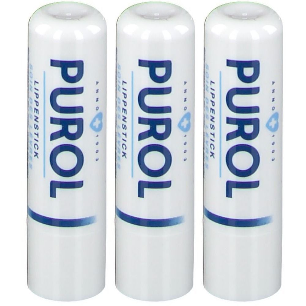 Drie witte lippenstiften met blauwe tekst. Opschrift: PUROL, LIPPENSTICK, SOIN DES LEVRES. Met logo en jaartal 1903.