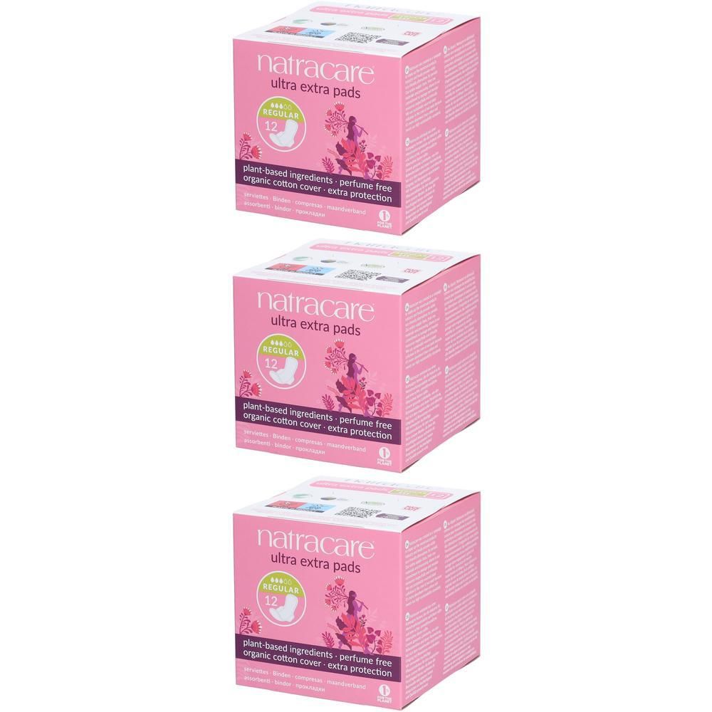 Drie roze dozen Natracare Ultra Extra pads. Opschrift: 12 stuks, plantaardige ingrediënten, parfumvrij, biologisch katoen.