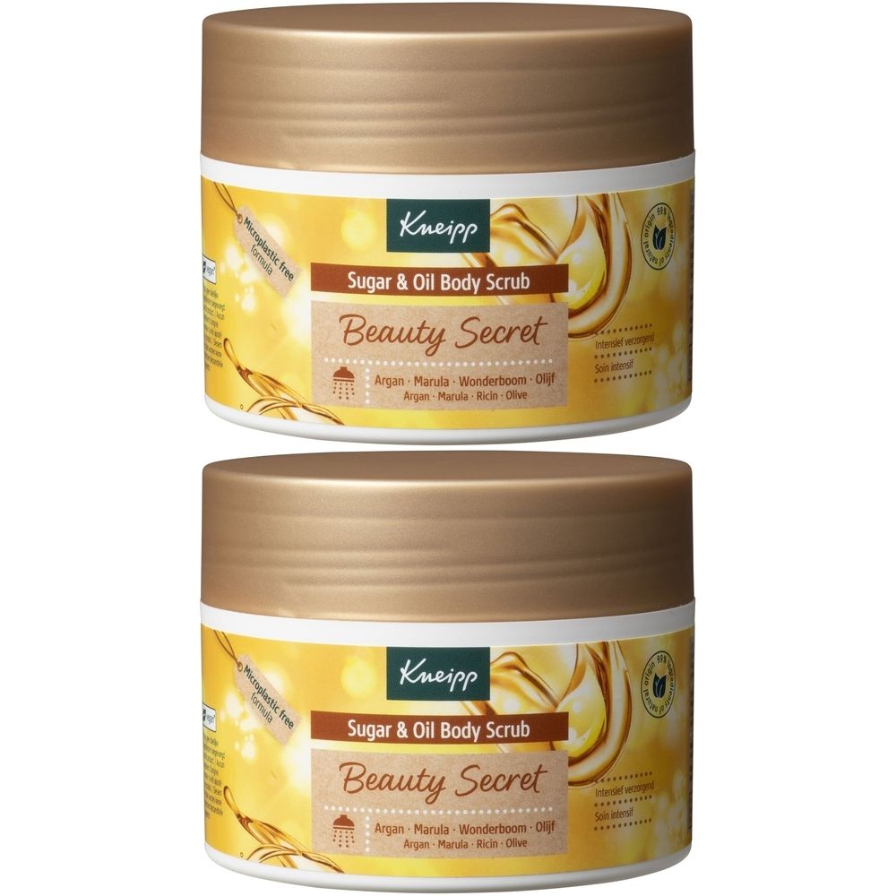 Deux pots dorés avec couvercles à vis. Les étiquettes indiquent Kneipp, Sugar & Oil Body Scrub, Beauty Secret.